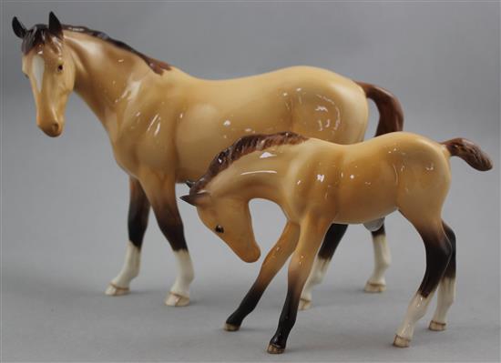 Two Beswick dun coloured horses from the BCC 1997 issue, 23cm and 16cm